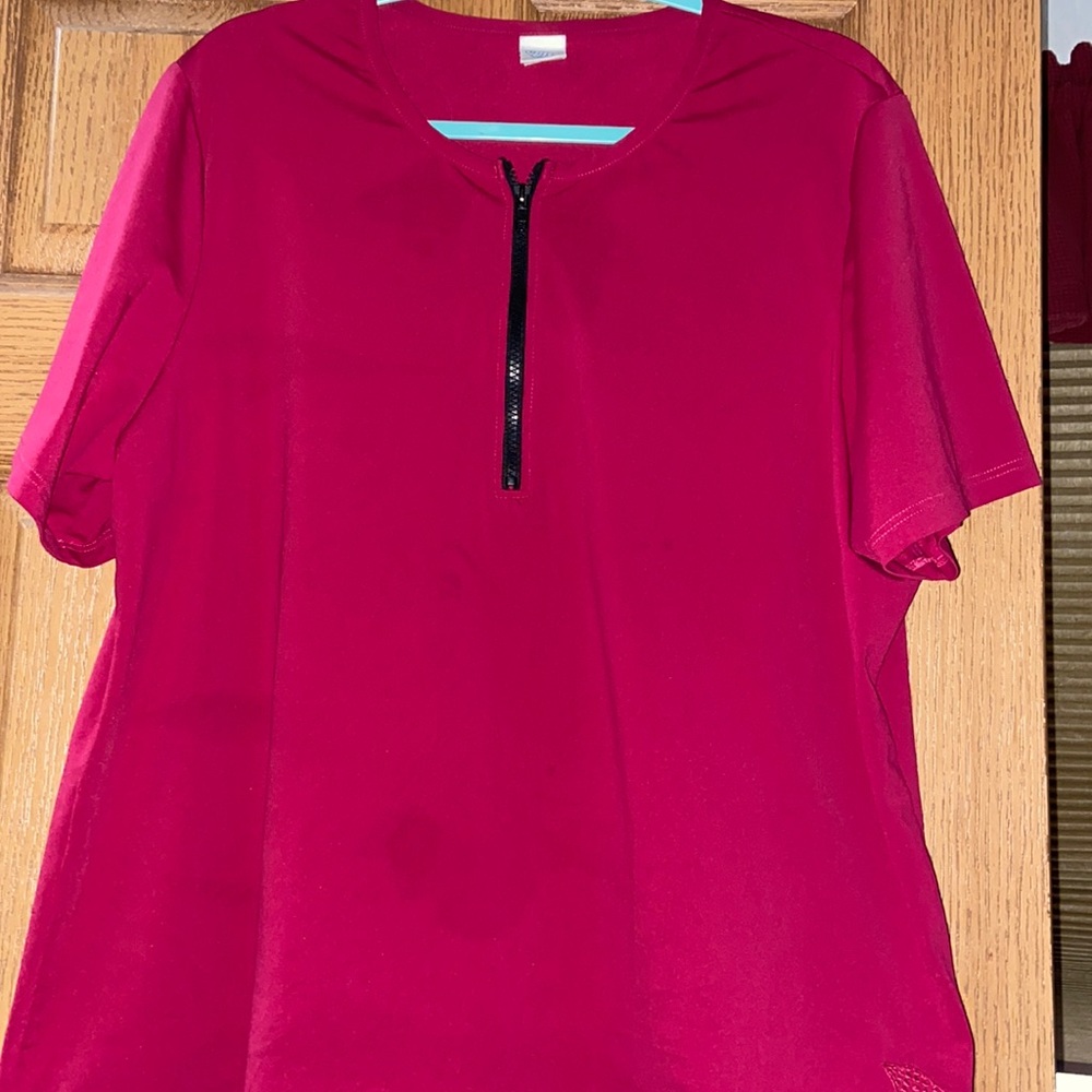 Junonia rash guard swim top. Short sleeve.  Easy easy and wear.  Dries quickly.